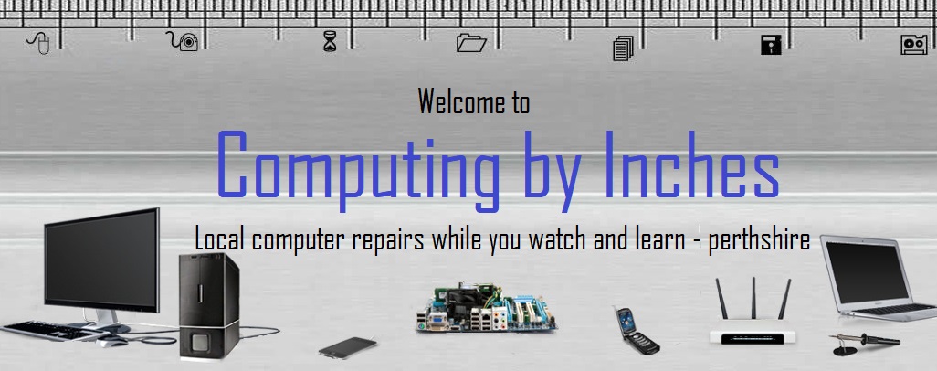 a picture of my new banner for computing by inches with computers on it!