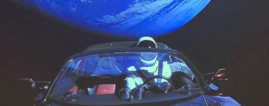 an image of starman in his Tesla with the earth behind
